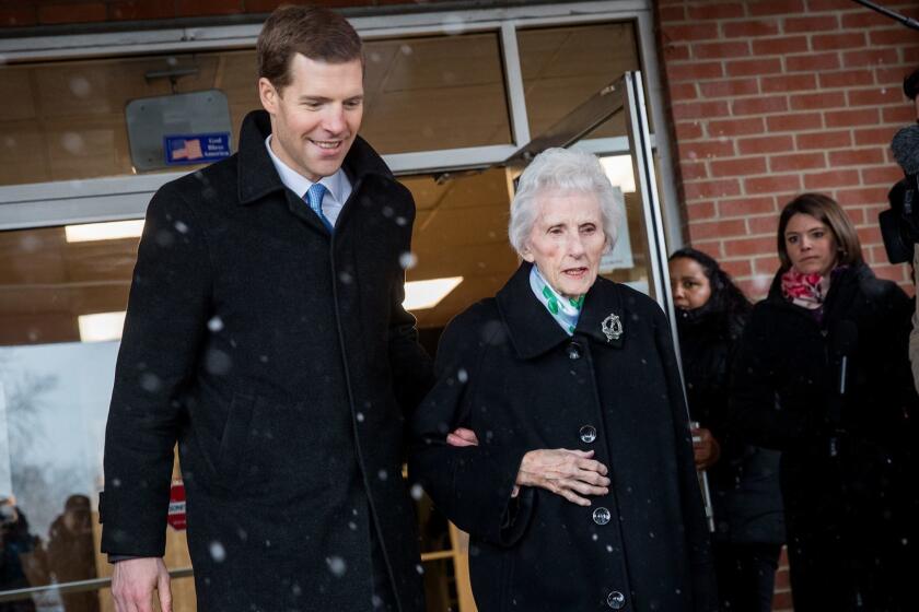 CARNEGIE, PA - MARCH 13: (L to R) Conor Lamb, Democratic congressional candidate for Pennsylvania's 18th district, and his grandmother Barbara Lamb exit the polling station after she voted at Our Lady of Victory Church, March 13, 2018 in Carnegie, Pennsylvania. Voters head to the polls today as Lamb is running in a tight race for the vacated seat of Rep. Tim Murphy (R-PA) against Republican candidate Rick Saccone. (Photo by Drew Angerer/Getty Images) ** OUTS - ELSENT, FPG, CM - OUTS * NM, PH, VA if sourced by CT, LA or MoD **