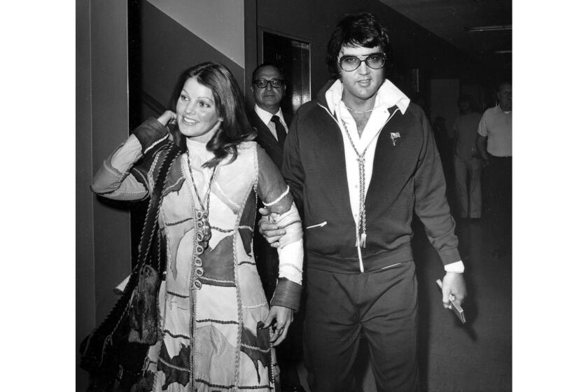 Oct. 9, 1973: Elvis and Priscilla Presley leave Los Angeles County Superior Court in Santa Monica after their divorce is granted by a judge.
