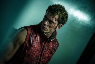 A man with a bloodied face is ready for action.