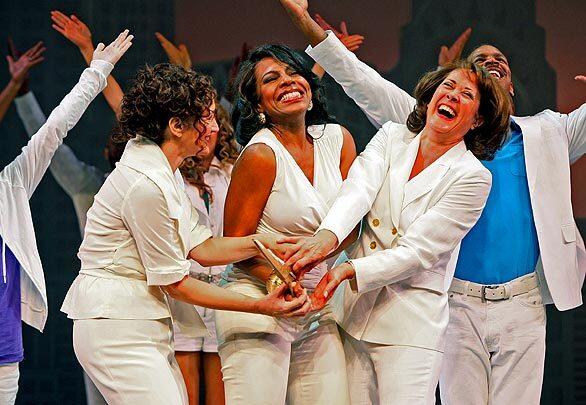 Barbara Walsh, left, as Brenda, Sheryl Lee Ralph as Elyse and Karen Ziemba as Annie perform in the final number of the new musical "The First Wives Club" during a dress rehearsal at the Old Globe Theatre in San Diego. The musical runs from July 17 through Aug 23.