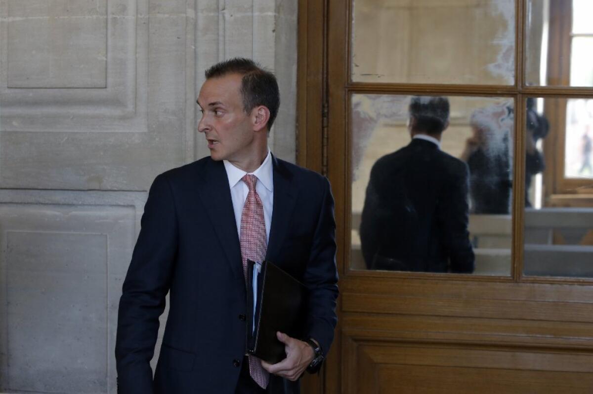 The head of the U.S. Anti-Doping Agency, Travis Tygart, arrives for a senate-led inquiry into the fight against doping in Paris.