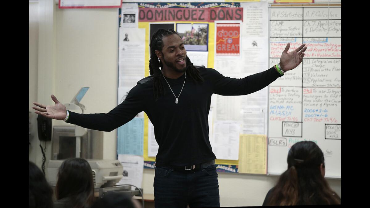 Richard Sherman is filmed while visiting the Dominguez High calculus class of teacher Paul Kreutz. Sherman, a graduate of Dominguez and Stanford University, credits Kreutz as being one his more influential teachers.