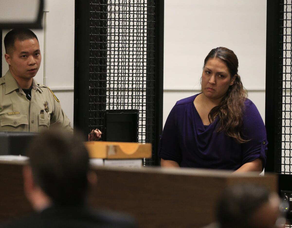 Candace Marie Brito arrives for a preliminary hearing with co-defendant Vanesa Zavala (not shown) at the West Justice Center in Westminster. Brito and Zavala are charged in the beating death of Kim Pham in front of a Santa Ana nightclub.