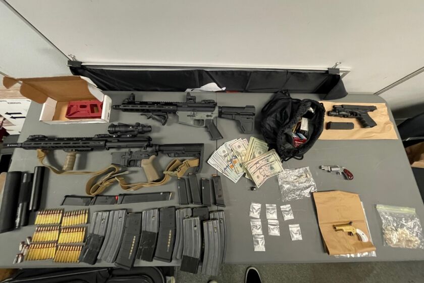 Police seized ghost gun manufacturing equipment, weapons, drugs and cash at Pacific Beach home on New Year's Eve.