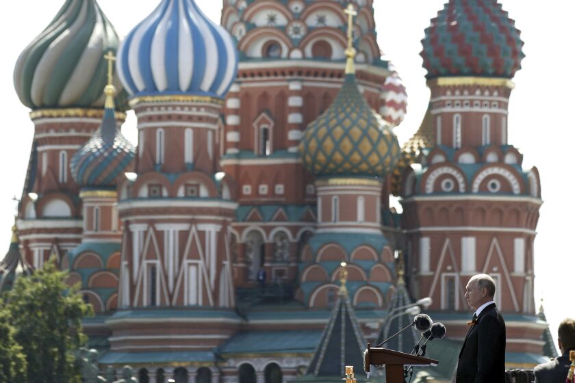 Russian President Vladimir Putin delivers his speech during the Victory Day military parade marking the 75th anniversary of the Nazi defeat in Moscow, Russia, Wednesday, June 24, 2020. The Victory Day parade normally is held on May 9, the nation's most important secular holiday, but this year it was postponed due to the coronavirus pandemic. (Dmitry Astakhov, Sputnik, Kremlin Pool Photo via AP)