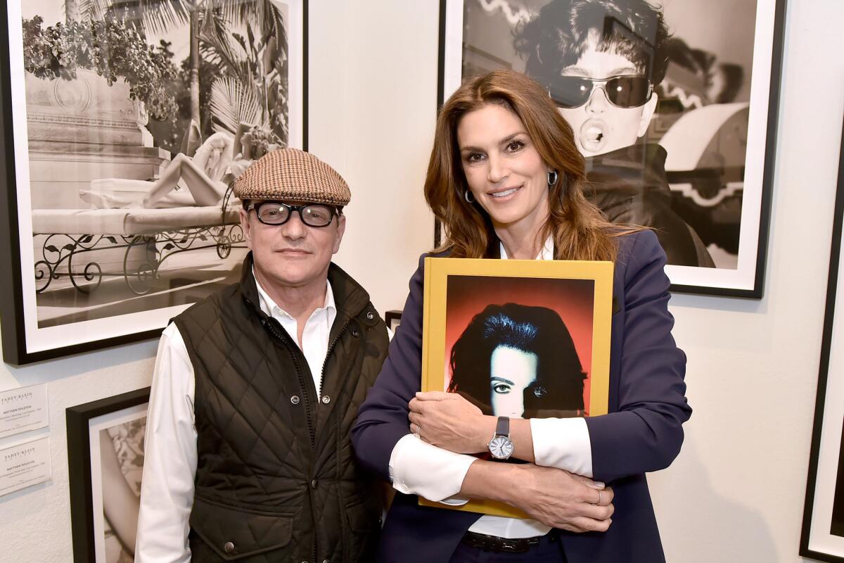 Matthew Rolston and Cindy Crawford at the opening event for the new Rolston exhibition, "Hollywood Royale: Out of the School of Los Angeles," at the Fahey/Klein Gallery in Los Angeles.