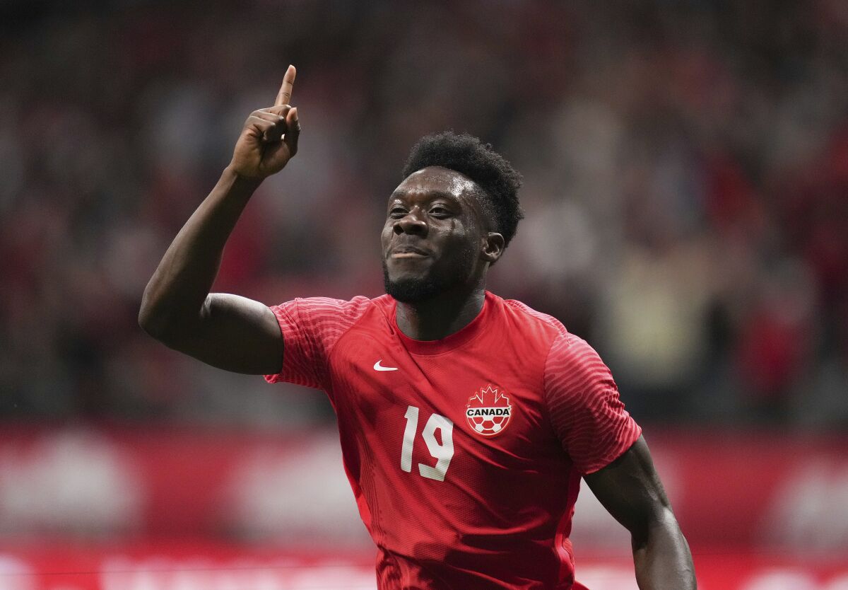 Canada's Alphonso Davies celebrates his penalty-kick goal against Curacao during the first half of a CONCACAF Nations League soccer match Thursday, June 9. 2022, in Vancouver, British Columbia. (Darryl Dyck/The Canadian Press via AP)