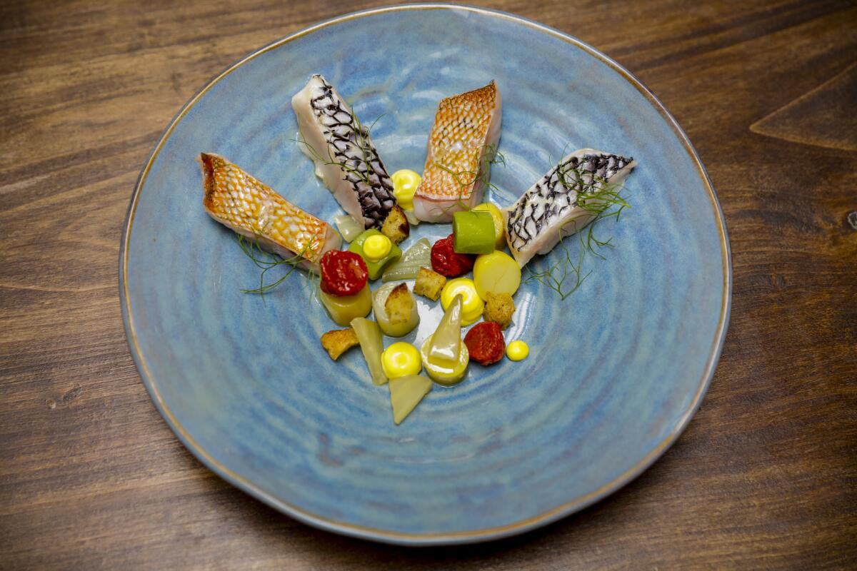 Bourride, a delicate fish stew with fennel, potato, leeks, garlic, saffron and aioli.