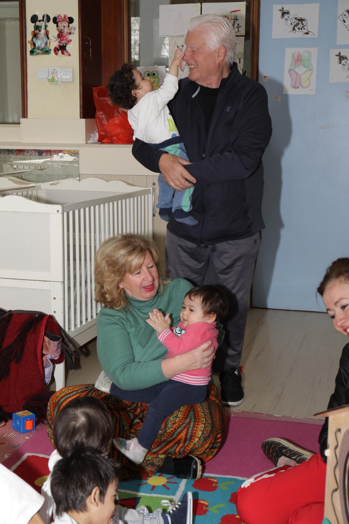 Linda and Charles Van Kessler at a Serbian orphanage.