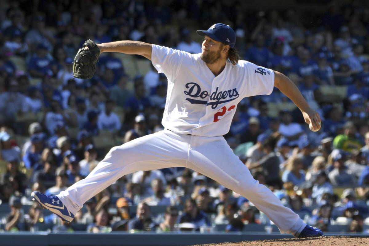Los Angeles Dodgers pitcher Clayton Kershaw (22) throws to the plate during of a baseball game against the San Francisco Giants, Sunday, Sept. 24, 2017, in Los Angeles.