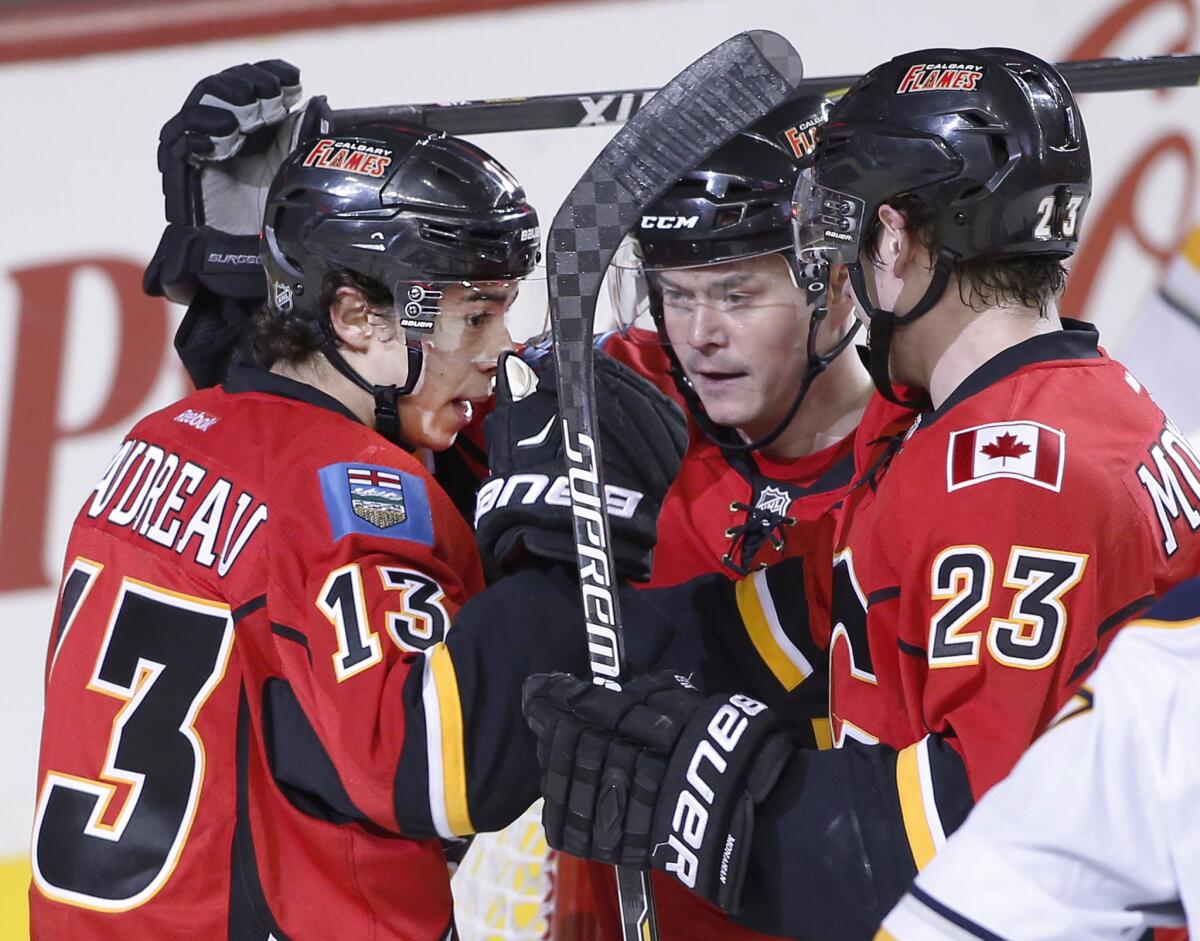 Calgary's line of Johnny Gaudreau, Jiri Hudler and Sean Monahan (from left to right) has stepped up in the wake of Mark Giordano's season-ending injury.