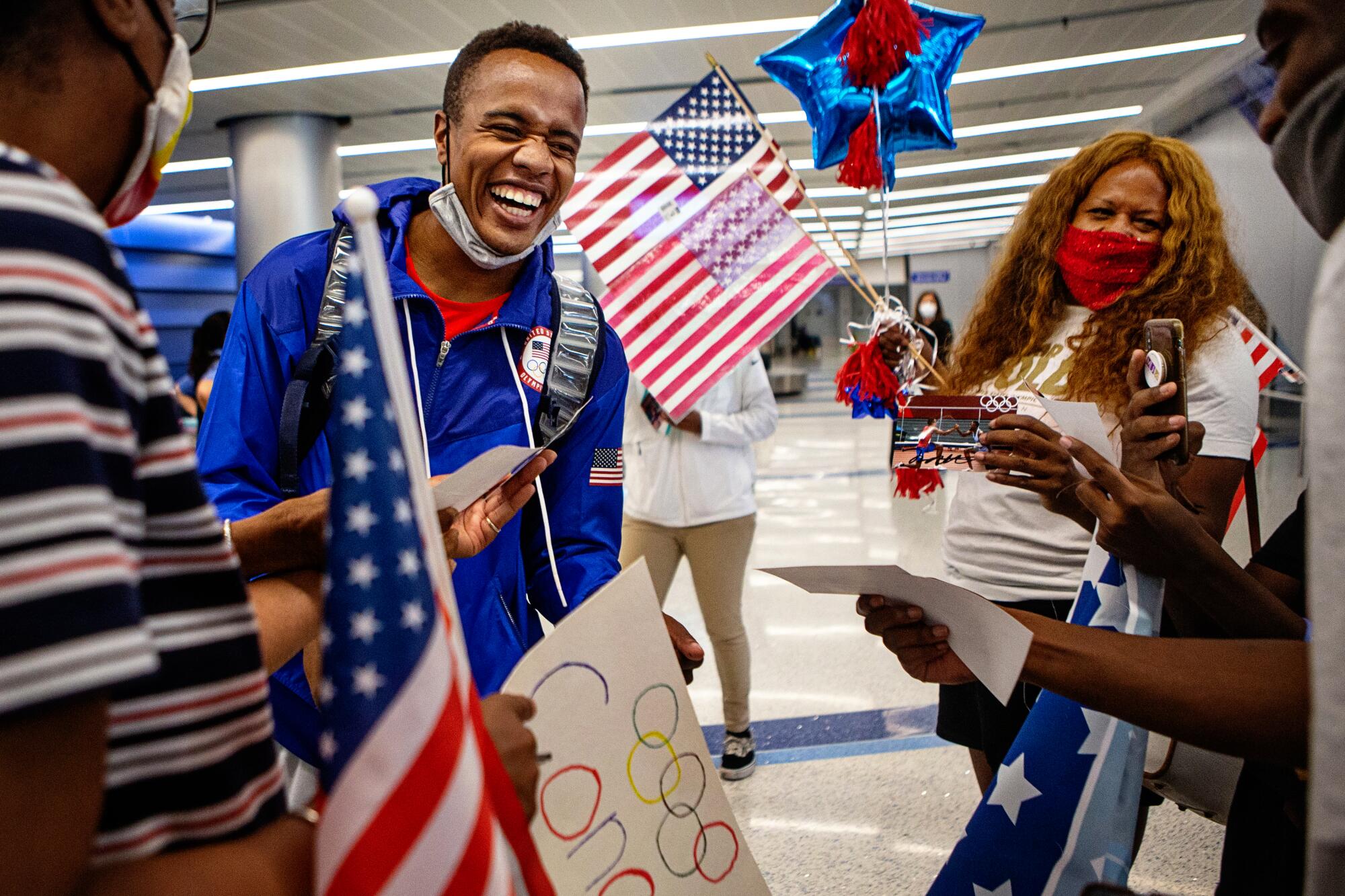 Isaiah Jewett returns from the 2021 Tokyo Olympics to a hero's welcome at LAX.