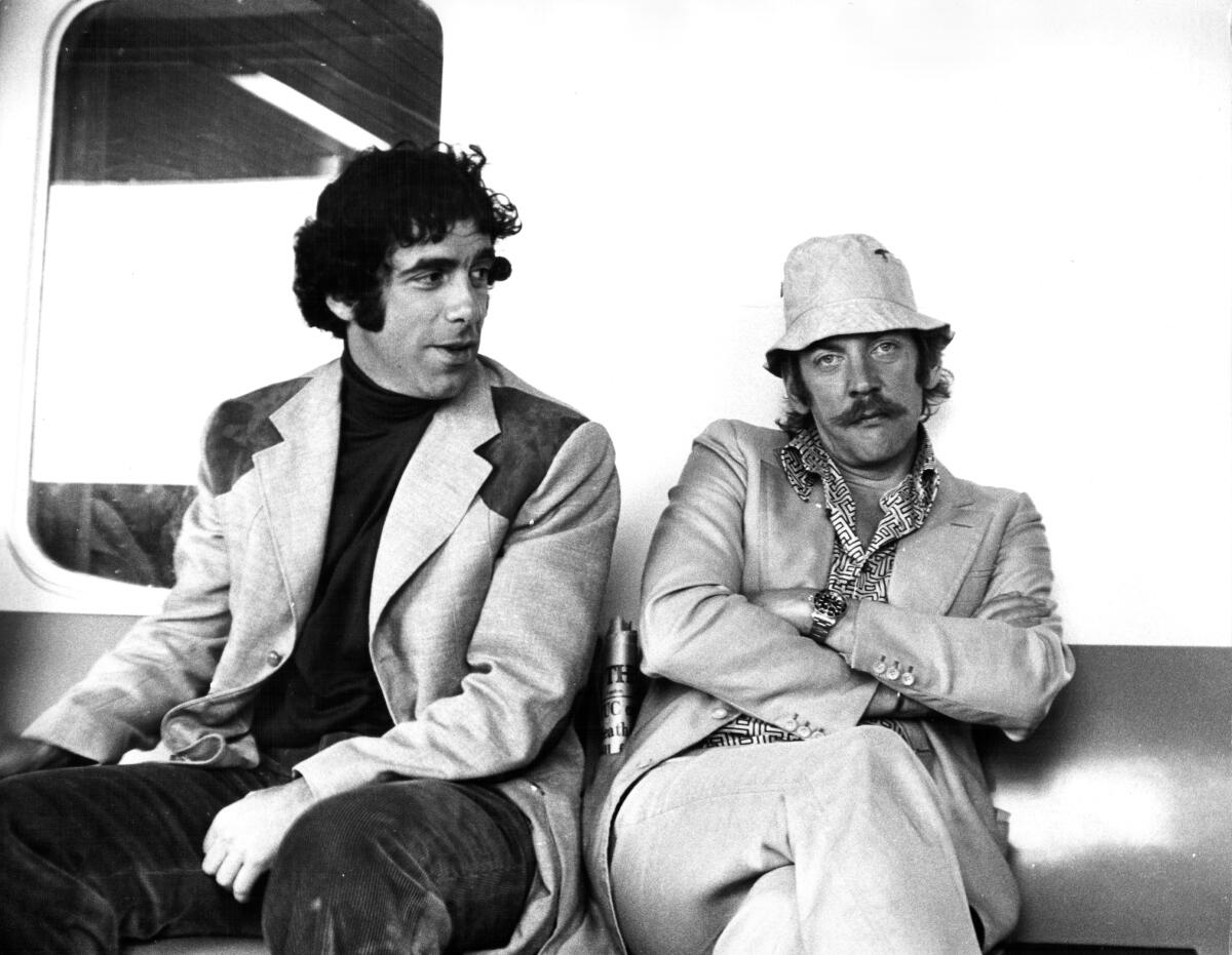 Actors Elliott Gould and Donald Sutherland in a scene from the movie 'Spys', 1974. 