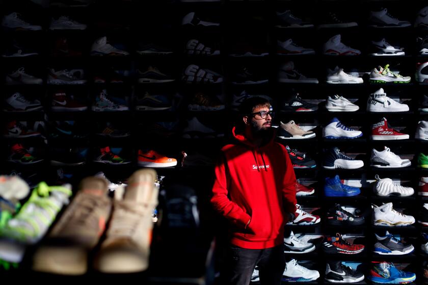 LOS ANGELES, CALIFORNIA-JANUARY 7, 2020: Adeel Shams poses for a portrait at his store Cool Kicks on January 7, 2020 in Los Angeles, California. Shams is a 28-year old millionaire owner of the bricks and mortar sneaker resale store where customers are converting their collections into quick cash. (Photo By Dania Maxwell / Los Angeles Times)