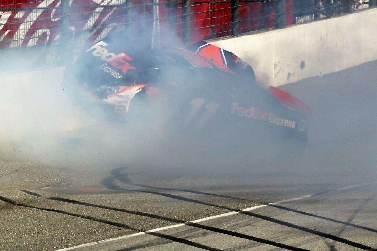 NASCAR driver Denny Hamlin suffered a compression fracture in his back Sunday when he crashed into a wall on the final lap at Fontana.