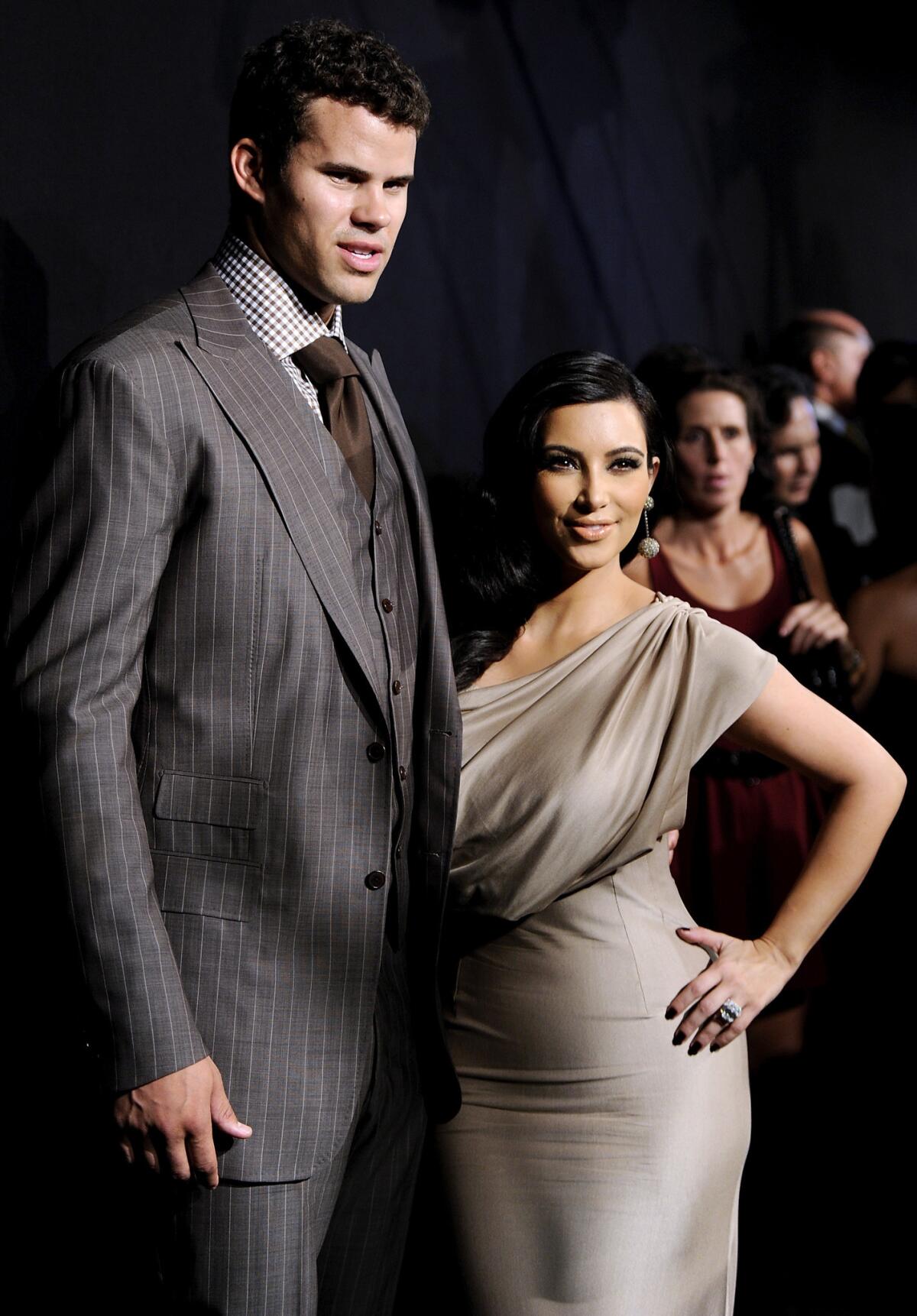 Then-newlyweds Kim Kardashian and Kris Humphries attend a party thrown in their honor in New York in 2011.