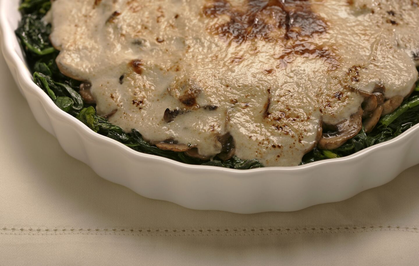 Looking at the finished product, you might never guess this gratin has only 6 ingredients. Recipe: Mushroom and spinach gratin