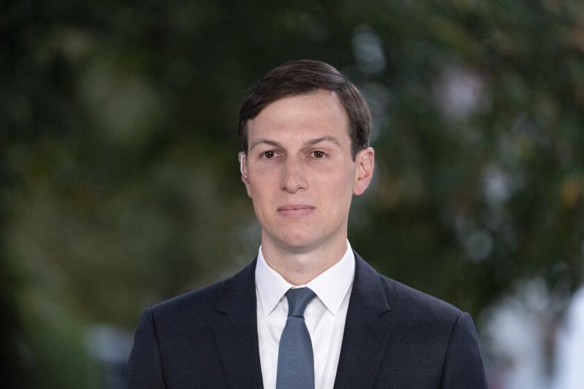 White House senior adviser Jared Kushner does a television interview at the White House, Monday, Oct. 26, 2020, in Washington. (AP Photo/Alex Brandon)