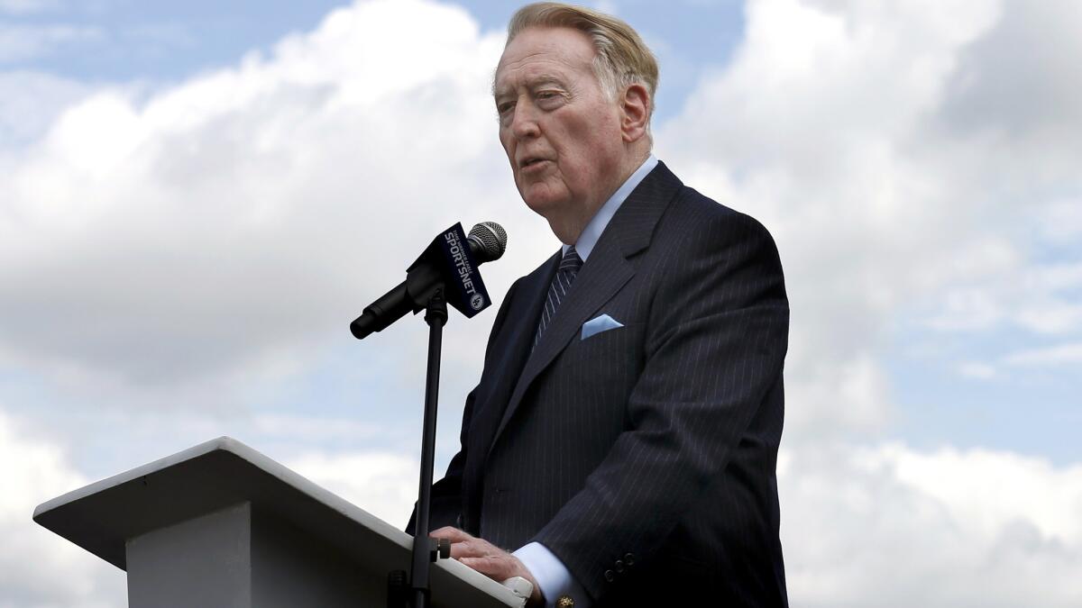 Vin Scully addresses the audience during a ceremony to rename a street Vin Scully Avenue near Dodger Stadium.