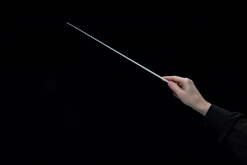 Hand with conductor's baton