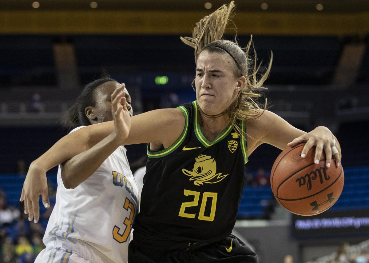 Oregon guard Sabrina Ionescu, shown driving to the basket against UCLA on Feb. 14 at Pauley Pavilion, is the consensus No. 1 pick for the WNBA draft on April 17.