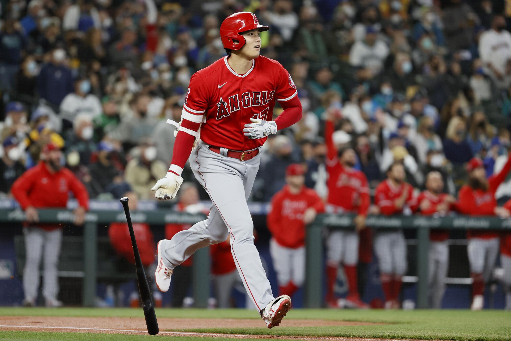 Shohei Ohtani of the Angels watches his home run against the Seattle Mariners.