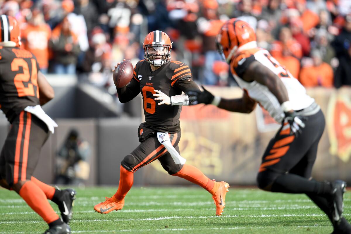 Cleveland Browns quarterback Baker Mayfield looks to pass against the Cincinnati Bengals on Sunday.