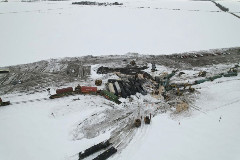 This photo provided by Joshua Henderson shows a Canadian Pacific train derailed in rural North Dakota on Sunday, March 26, 2023, which spilled hazardous materials, but local authorities and the railroad said there is no threat to public safety. There were no injuries and no fire associated with the derailment, which occurred in a rural area outside Wyndmere, N.D., a town of several hundred people about 60 miles (97 kilometers) southwest of Fargo. (Joshua Henderson via AP)