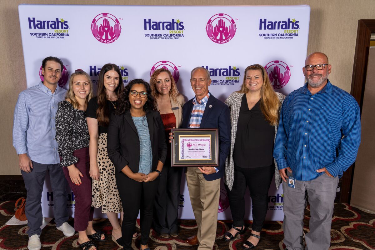 Harrah Resort Southern California presents a $55,000 grant to Feeding San Diego team members.
