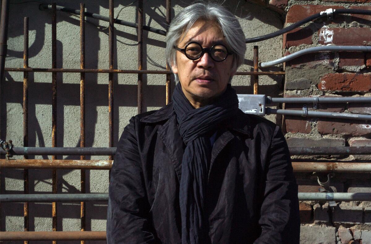 The Oscar-winning Japanese composer Ryuichi Sakamoto, shown in 2010 in West Hollywood, said he is canceling appearances to focus on treatment for throat cancer.