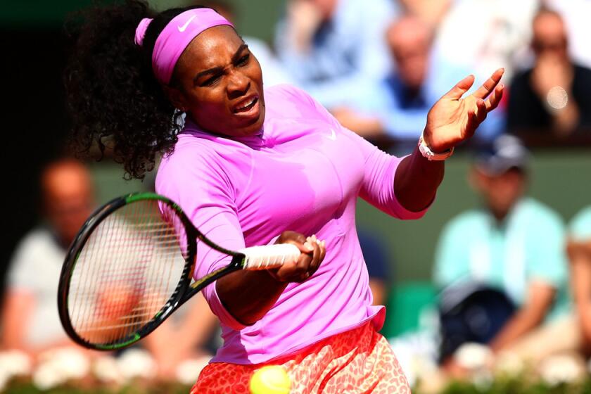 Serena Williams returns a shot during her match against Sloane Stephens on day nine of the 2015 French Open at Roland Garros in Paris on Monday.