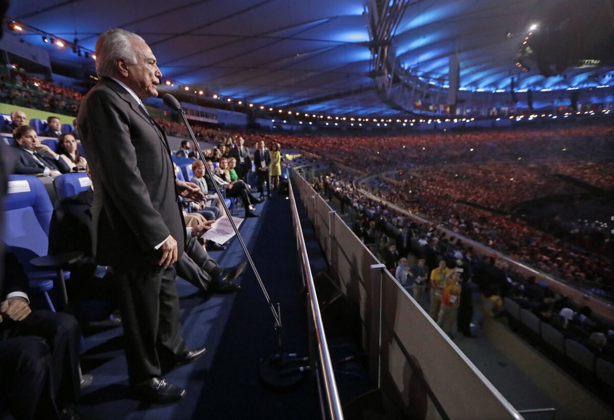 Interim Brazilian President Michel Temer speaks -- without being introduced -- at the opening ceremony of the 2016 Summer Olympics at the Maracana soccer stadium in Rio de Janeiro.