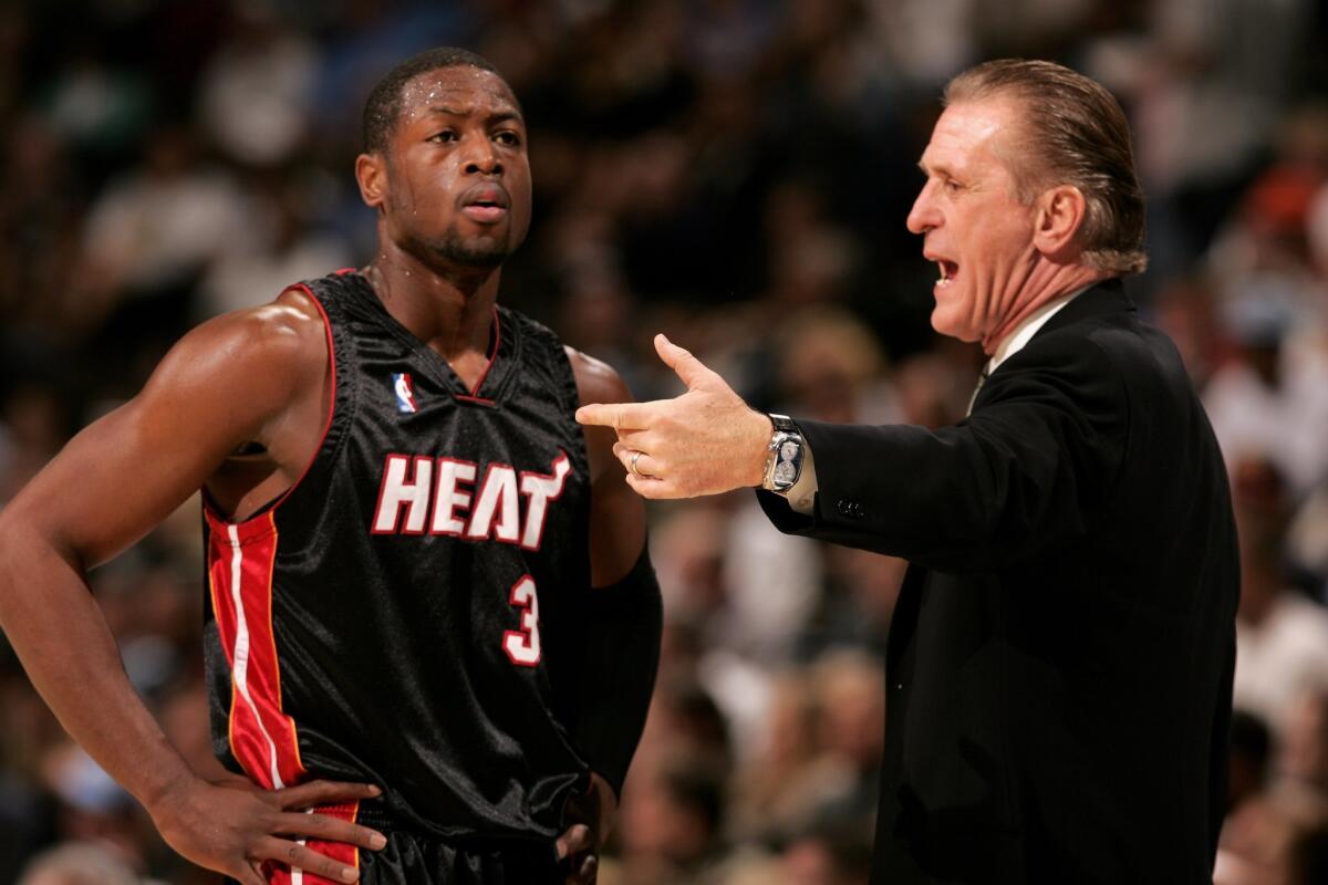 Dwyane Wade and Pat Riley on Dec. 8, 2006