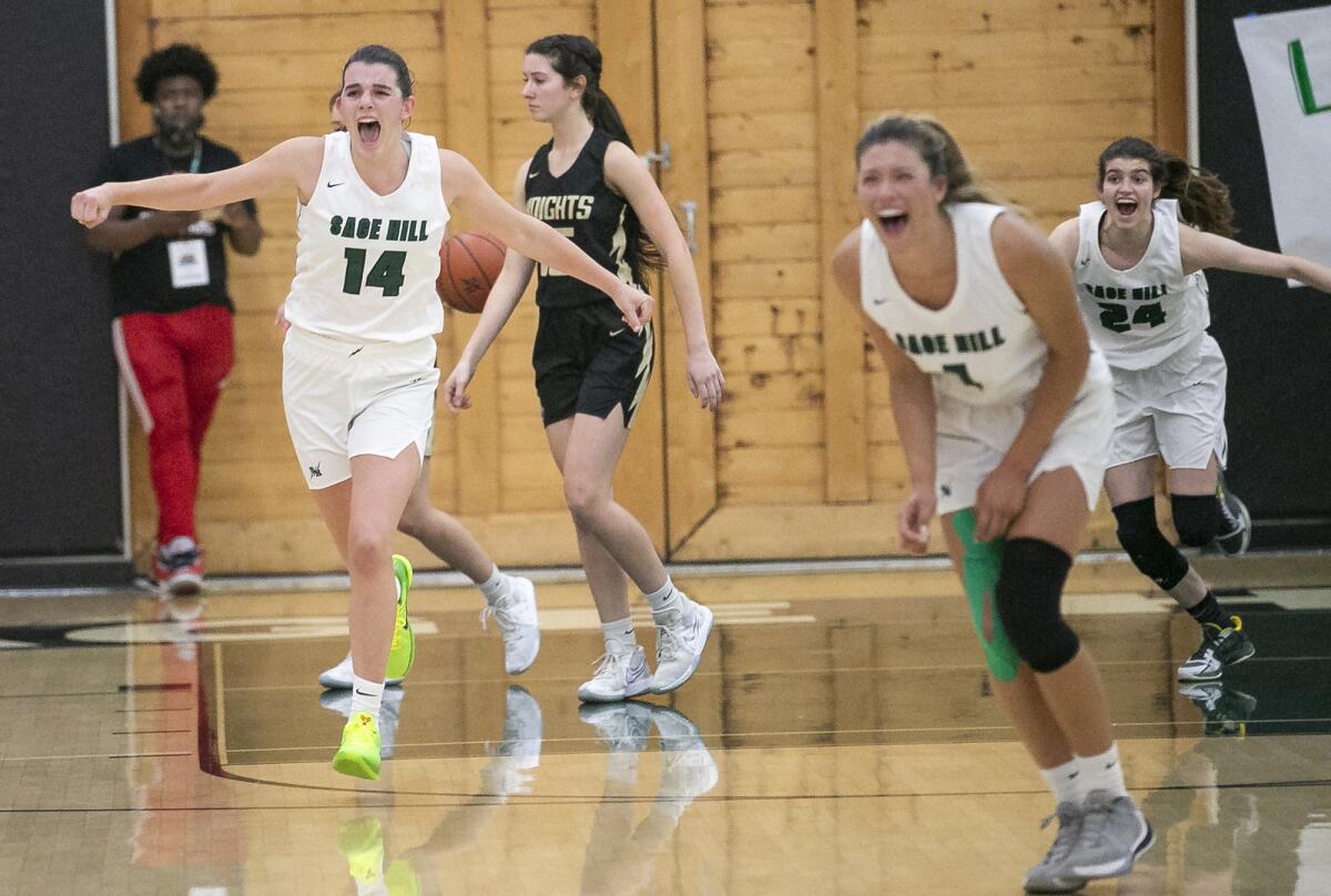 Sage Hill's Emily Eadie, left, Emily Elliott, center and Isabel Gomez, right, celebrate as the clock runs out.