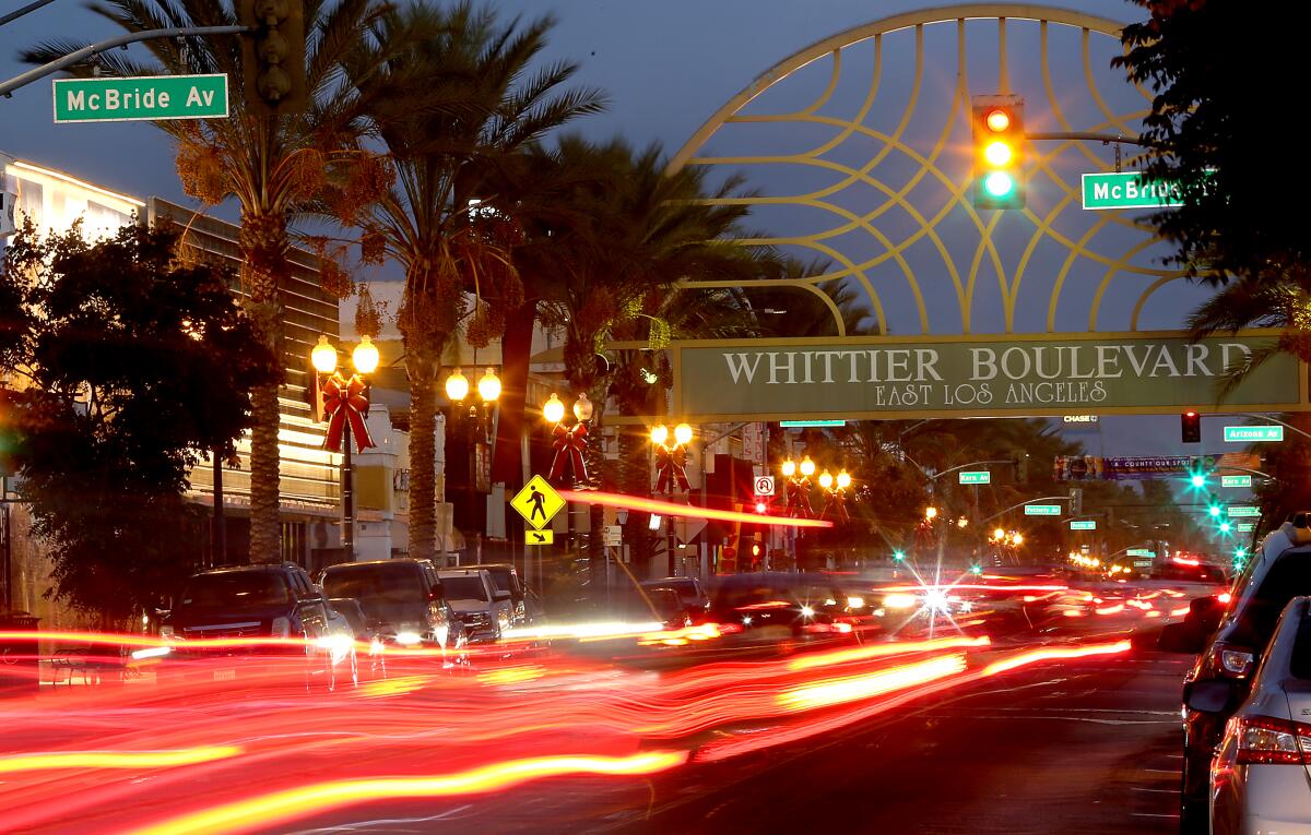 An artistic photo of nighttime traffic on Whittier Boulevard.