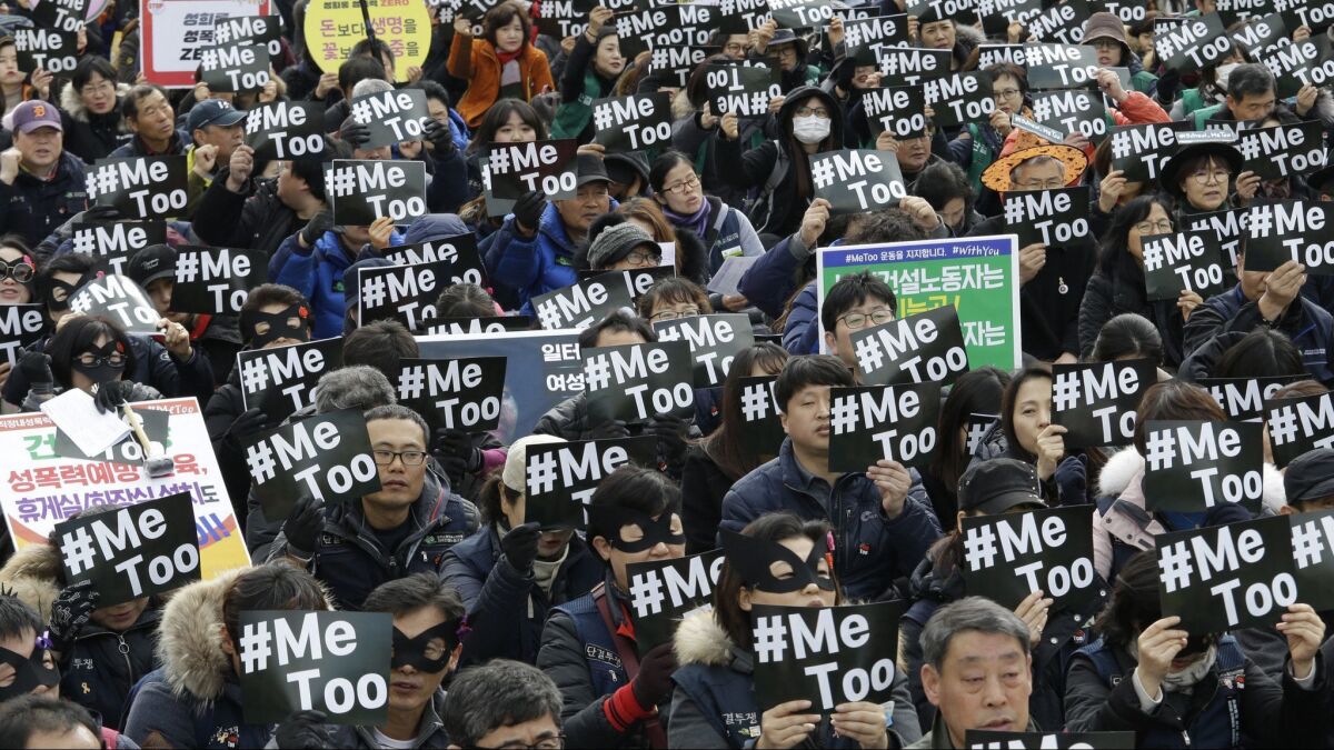 Demonstrators supporting the #MeToo movement rally to mark International Women's Day on March 8, 2018, in Seoul.