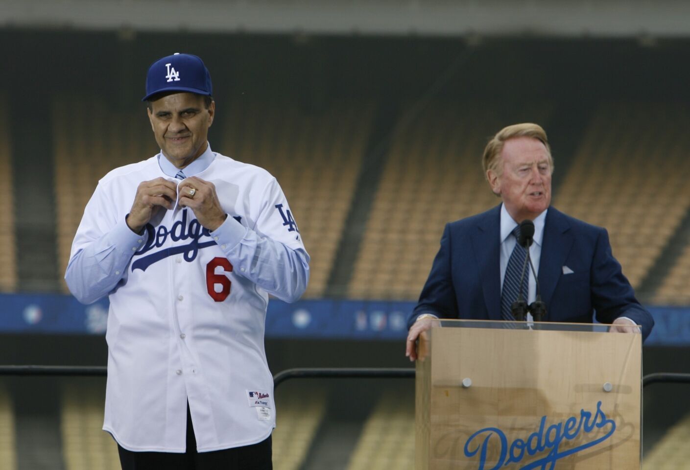 Vin Scully speaks during manager Joe Torre's introductory news conference at Dodger Stadium in November 2007.