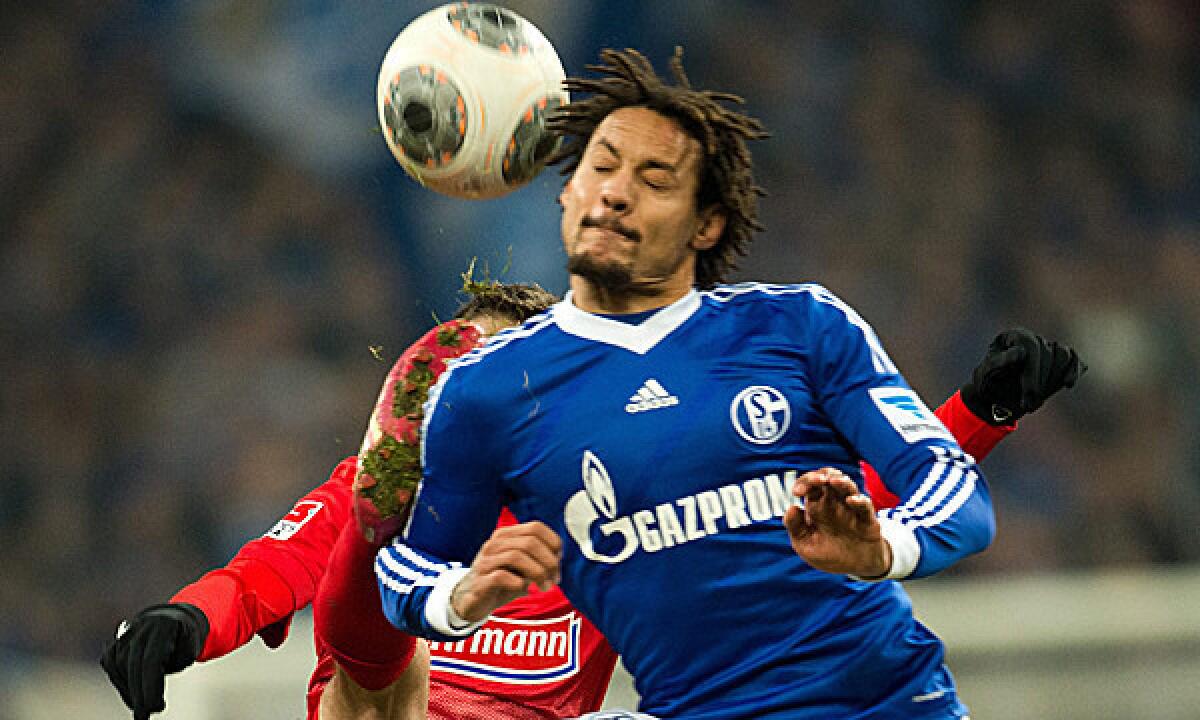 Jermaine Jones of Schalke 04 heads for the ball during the Bundesliga soccer match against SC Freiburg in December. Will Jones be available to play for the U.S. World Cup team in Brazil?