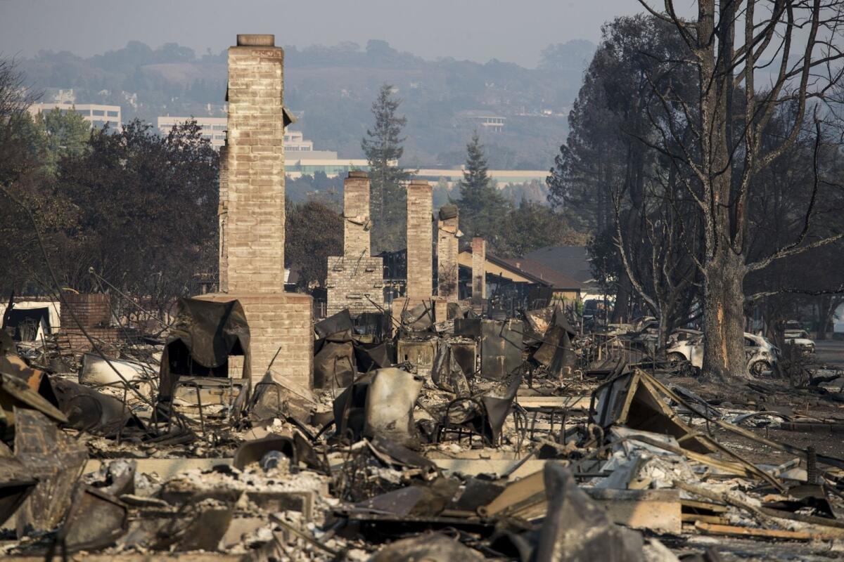 A row of houses in Santa Rosa, Calif., lies in ruins in October 2017 as fires swept through wine country.