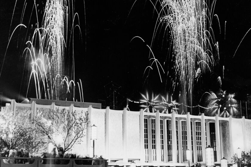 The sky above LACMA is lighted by a colorful fireworks show during formal dedication ceremonies on opening night, March 30, 1965.