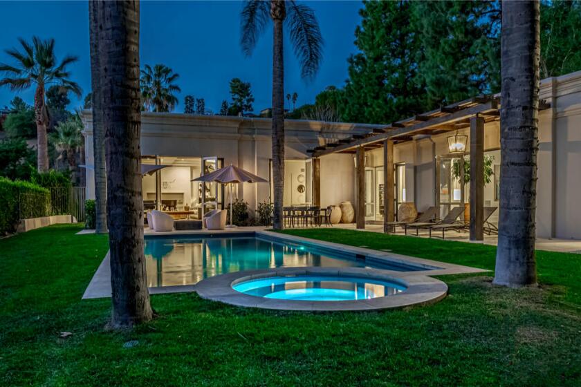 The half-acre estate includes a 5,500-square-foot villa, a swimming pool and a guesthouse that's currently under construction.