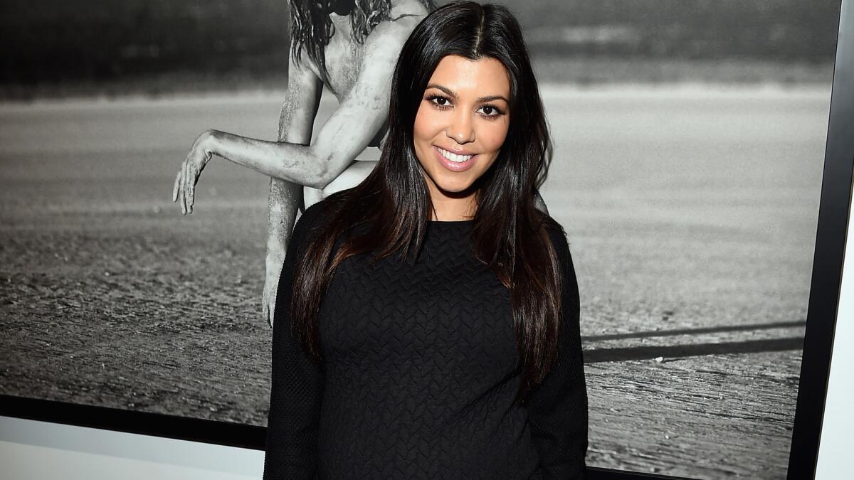 Kourtney Kardashian reveals that her third child will be a boy.