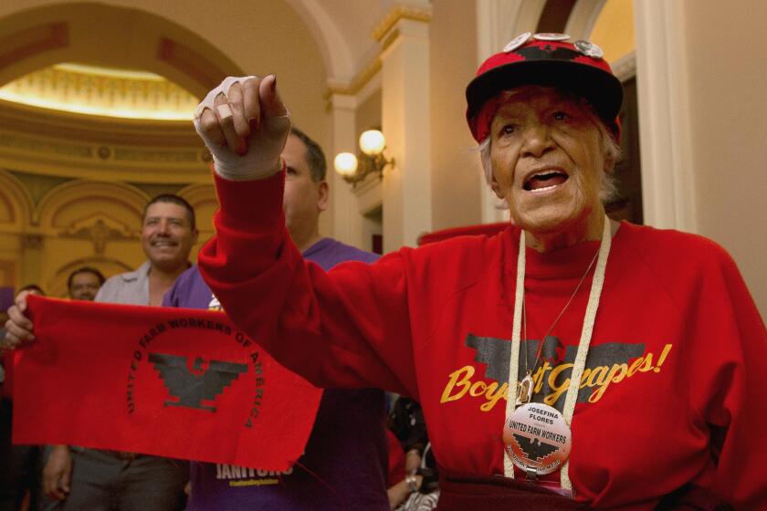 Farmworkers and their supporters gather outside the office of Assembly Speaker Anthony Rendon after the Assembly failed to vote on a farmworker overtime bill in August.