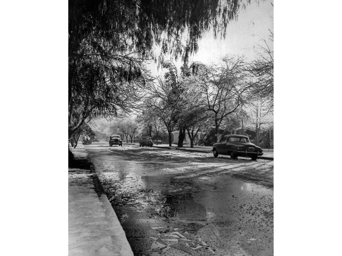 Jan. 12, 1949: Ice on Gilmore Street in Van Nuys forced vehicles to travel at a crawl.