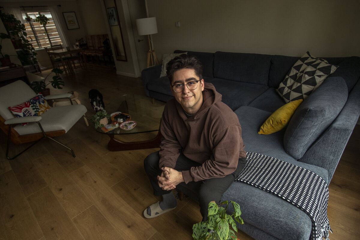Jacob Guardado inside his two-bedroom apartment in Studio City. 