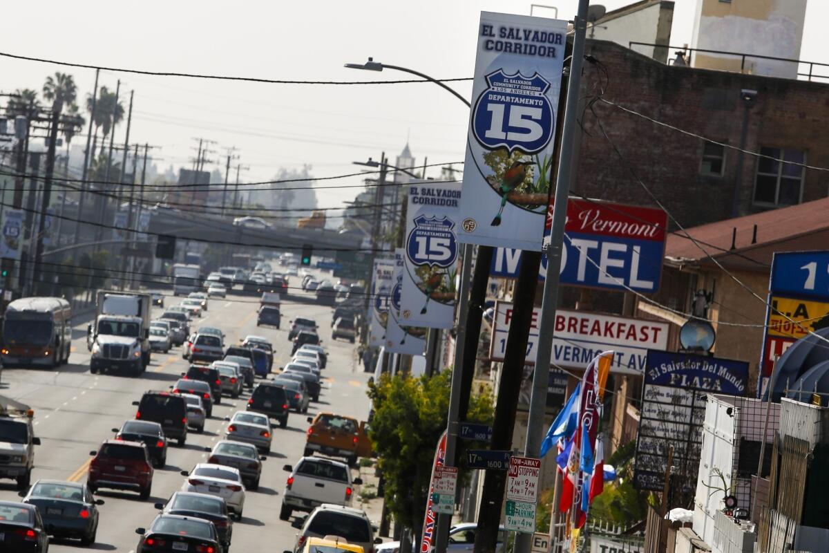 Signs denote the 12-block stretch of the El Salvador Corridor along Vermont Avenue near USC as the 15th Salvadoran state. It took a community leader about five years to win official approval of the area's name.