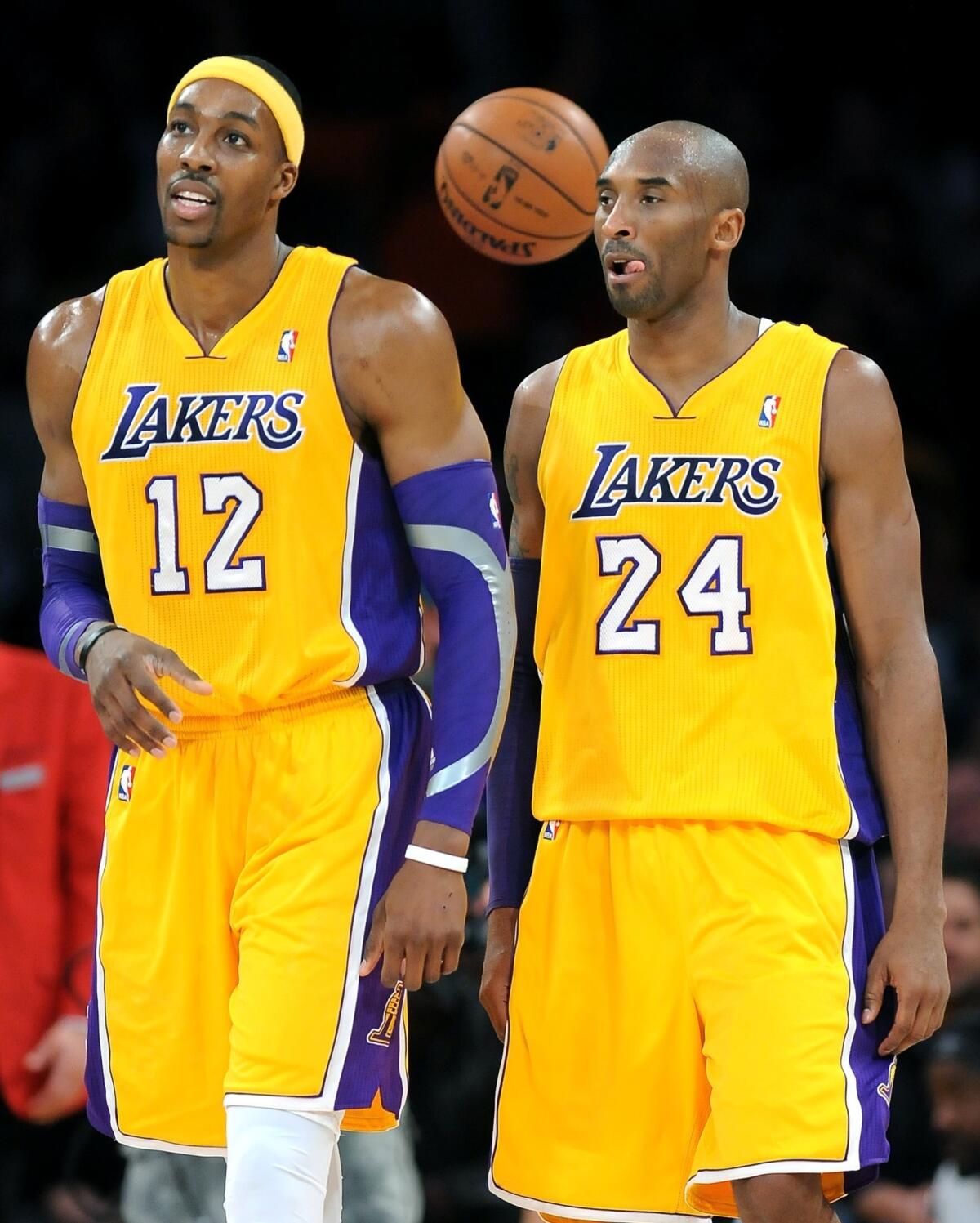 Lakers star Kobe Bryant, right, only had good things to say Thursday about former teammate and current Houston Rockets center Dwight Howard.