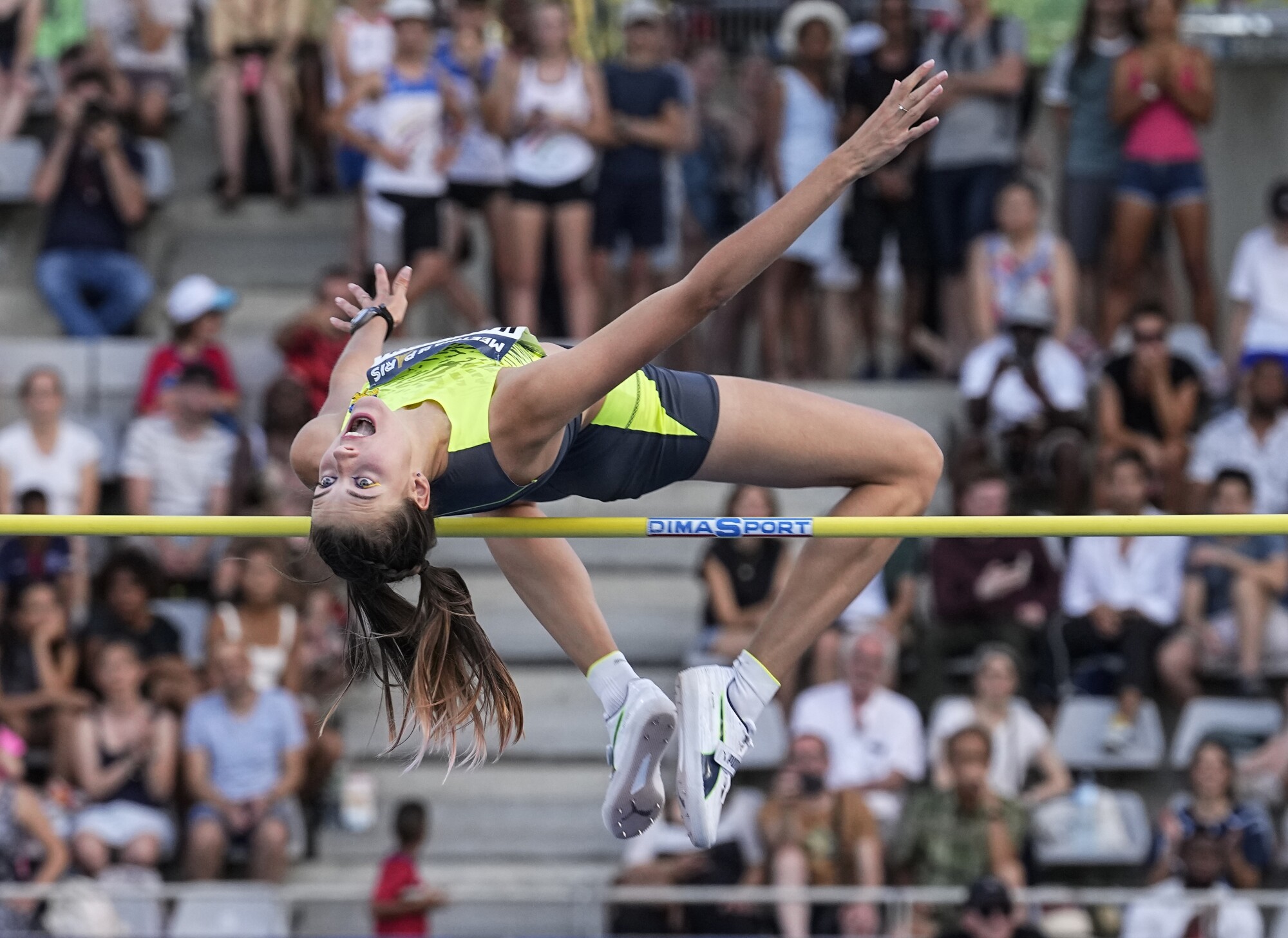 Yaroslava Mahuchikh clears the bar during a jump at the Diamond League meet in Paris.