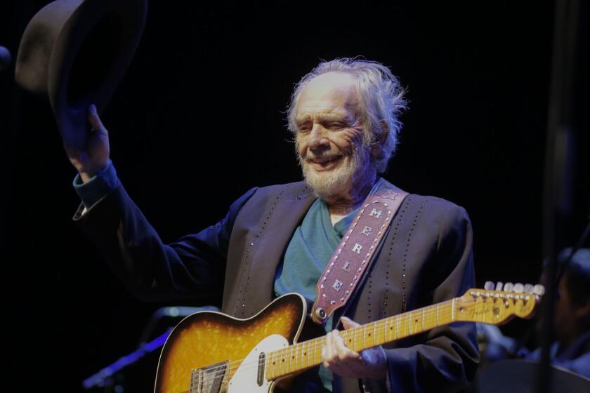 BEVERLY HILLS, CA, THURSDAY, FEBRUARY 11, 2016 - Merle Haggard salutes the audience in between songs while performing with Kris Kristofferson at the Saban Theater. (Robert Gauthier/Los Angeles Times)