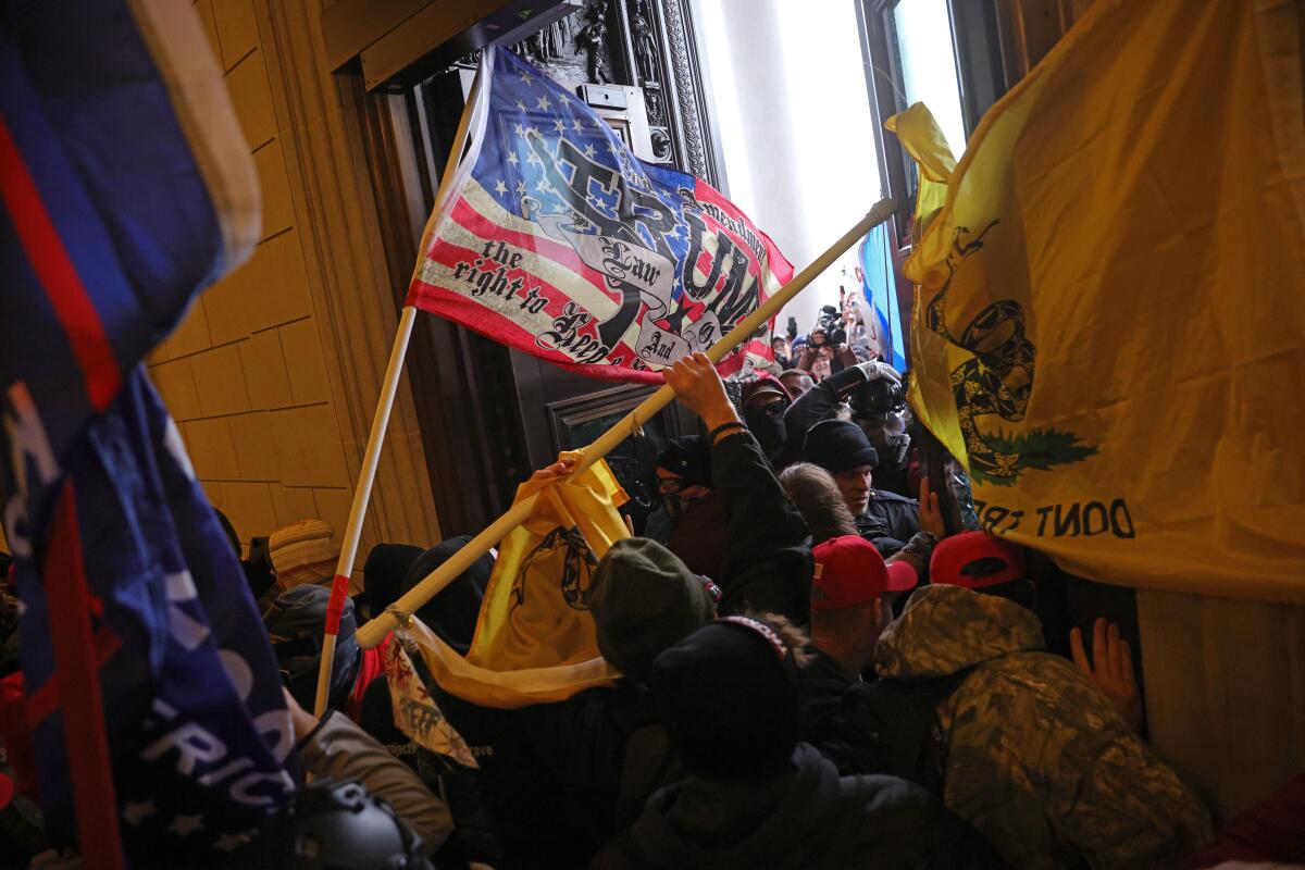 Rioters supporting President Trump storm the U.S. Capitol on Jan. 6. 